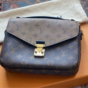 Louis Vuitton — reverse monogram crossbody pochette metis